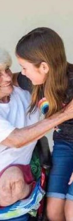 Ruby-Kate-Hugging-Older-Woman-GoFundMe-600×358