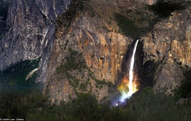 Fotografi kap ylberin në fund të ujëvarës madhështore