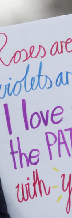 A protester takes part in the Women’s March calling for equality, justice and an end to austerity in London